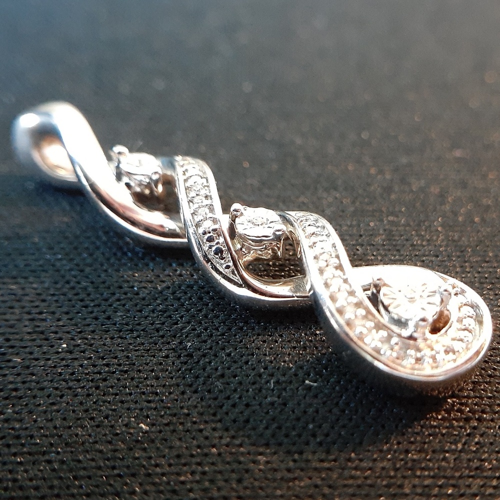 Infinity Twist  925 Sterling Silver and Cubic Zirconia Pendant